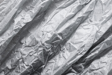 Crumpled grey tissue paper, textured background