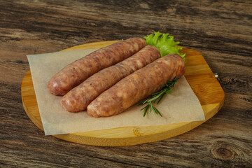 Raw pork meat sausages for grill