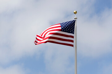 stars and stripes flag waving at the wind in United states of America