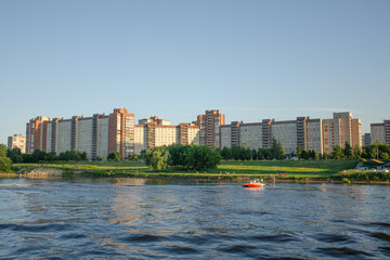 Obraz premium New residential complex on the banks of the Neva in St. Petersburg on a sunny summer day