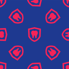 Red Dental protection icon isolated seamless pattern on blue background. Tooth on shield logo. Vector