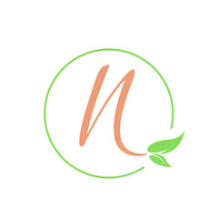Letter N logo.Calligraphic icon.Lettering sign isolated on light background.Decorative green leaf alphabet initial.Elegant, eco, natural, fresh food, beauty, spa style.