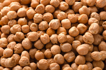 Close up of raw uncooked chickpeas beans background
