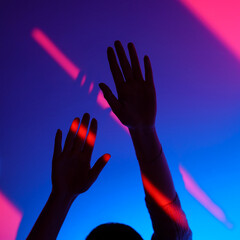 Closeup of silhouette of anonymous woman arm gesturing with open hand over fashion blue and pink wall background, neon red stripe on wrist. Colorful light, minimalism concept. 
