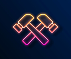 Glowing neon line Crossed hammer icon isolated on black background. Tool for repair. Vector