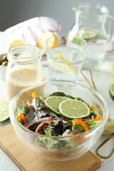 Concept of tasty food with vegetable salad with tahini sauce close up