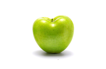 Green apple with shape of heart.