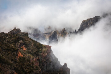 Mysterious mountains in Madeira, shrouded in fog. Pico do Arieiro and other peaks.
