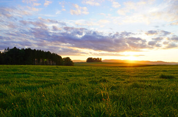 Obraz premium Sunset in the Sauerland. Landscape with setting sun in the evening.
