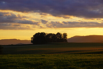 Sunset in the Sauerland. Landscape with setting sun in the evening.
