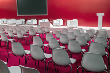 Conference Meeting Room, Row of White Chairs, with Stage