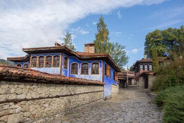 View of a street with traditional houses in the old town of Koprivshtitsa, Bulgaria