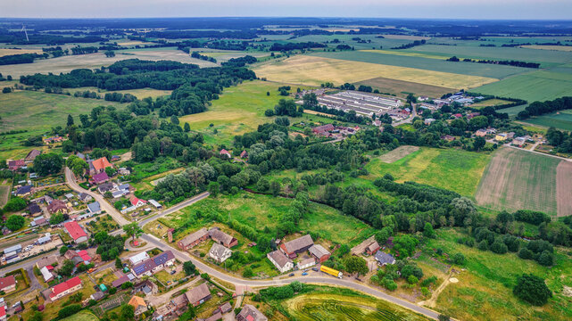 Landscape of polish village from above drone footage Kozielice gm Golczewo Poland Church