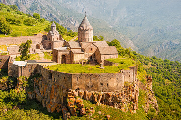 Majestic Tatev Monastery located on an inaccessible basalt rock with wonderful views of the Vorotan River gorge. Travel and worship attractions in Armenia