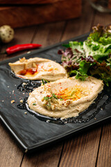 Gourmet classic hummus spread sauce with pita bread