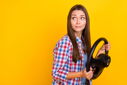 Profile Photo Of Nervous Inexperienced Driver Lady Hold Steering Wheel Wear Plaid Shirt Isolated Yellow Color Background