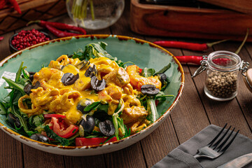 Top view on gourmet salad with seafood and greens