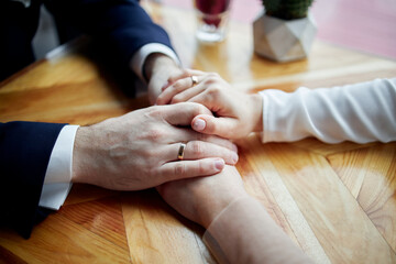 bride and groom hands