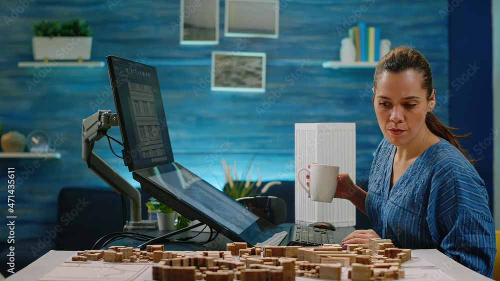 Poster woman architect working with touch screen monitor for construction layout. engineer analyzing buildi