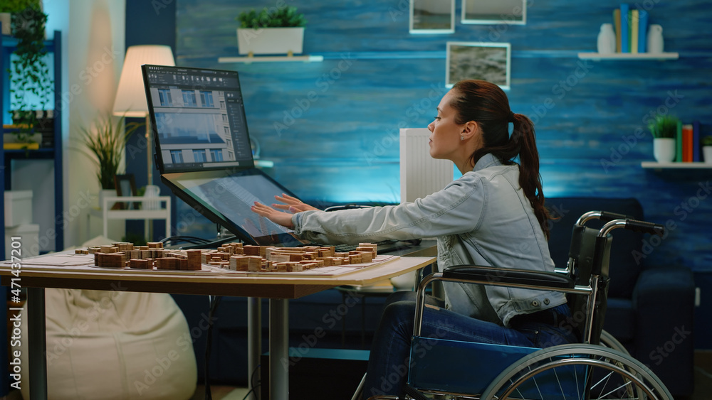 Poster disabled architect analyzing building model on touch screen monitor for construction layout. enginee