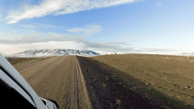 Car driving through Icelandic roads