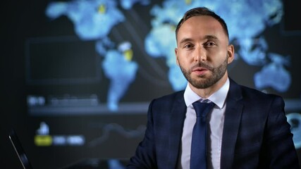 Business man news presenter blogger talking financial economy global trade at hologram map screen