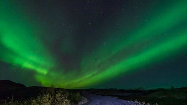 Northern lights Time Lapse with trail and lights