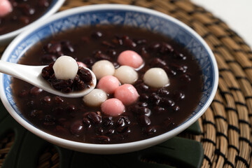 Red and white tangyuan with red bean soup.