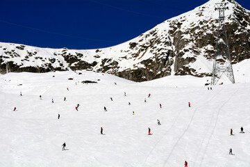 skiers on ski slopes, Fiescheralp - car free ski resort, accessble by cable car from Fiesch, UNESCO...