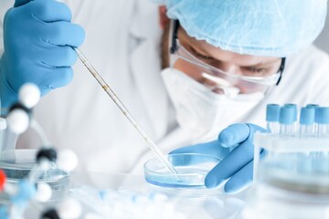 Health care researchers working in life science laboratory, work for test a vaccine