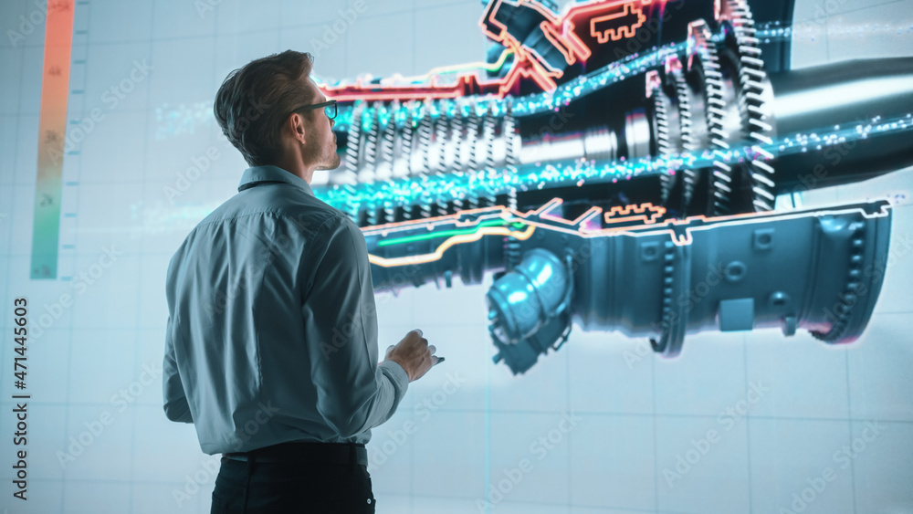 Poster Innovative Green Energy Startup: Engineer Designing Engine Using Tablet Computer and Big Wall Screen to Analyse Prototype. Concept for Sustainable Environmnetally Friendly Zero Emissions Turbine