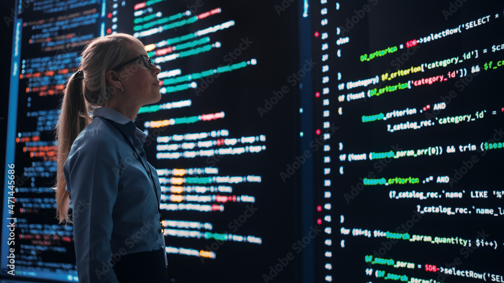 Poster High-Tech Startup Concept: Innovative Female Software Engineer Standing and Doing Big Data Analysis on Wall Screen Showing Porgramming Code. Developing Futuristic e-Commerce App with Machine Learning