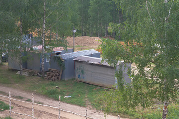 Naklejka premium Metal temporary vans for the accommodation of builders at the construction site