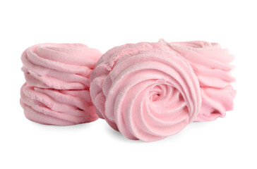 Many delicious pink zephyrs on white background