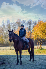 girl rider smiling after riding lesson - obrazy, fototapety, plakaty