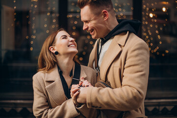 Young couple walking together on Christmas