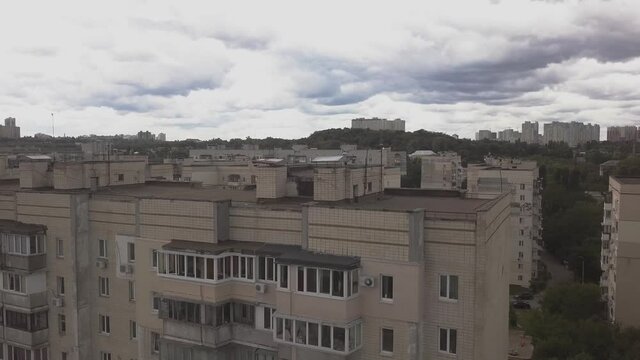 a video of a residential soviet building in kiev, ukraine during overcast, zoom out, eastern europe