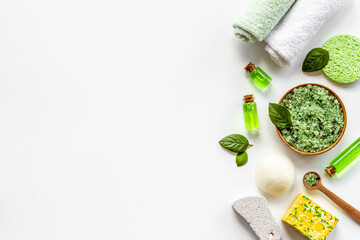 Frame of green aroma spa tea tree cosmetics with essential oil