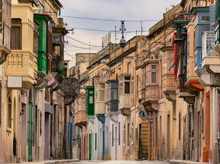 Street in the medieval city Rabat in Malta, ancient buildings with typical maltese balconies.
