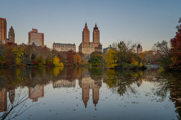Fototapeta na wymiar The Central Park Lake in Very Early Fall Morning in HDR