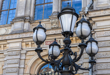 Bronze floor lamps in front of the Stieglitz Academy in St. Petersburg, Russia