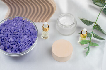 Spa background mockup, product advertising space. Spa composition with oils, sea salt and body moisturizer.