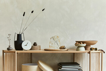 Stylish living room interior design with console. Sculpture, candlectick, minerals and personal accessories. Copy space. Template.