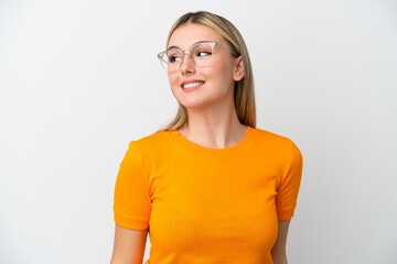 Young caucasian woman isolated on white background With glasses with happy expression