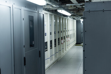 modern data center with rows of closed servers, cyber security concept