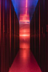 closed servers in modern data center with neon light, cyber security concept