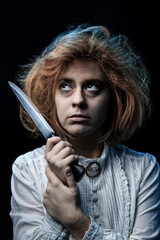 Scared  Woman Holding Knife 