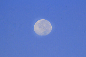 moon in the sky at day
