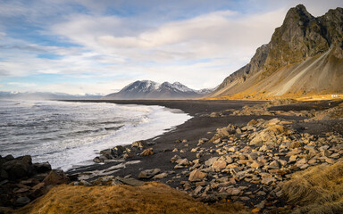 Eystrahorn mountains from Hvalnes lighthouse in Iceland. Hvalnes lava beach landscape, east Iceland landmark