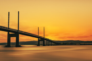 Fototapeta na wymiar The Kessock Bridge is a cable-stayed bridge across the Beauly Firth, an inlet of the Moray Firth, between the village of North Kessock and the city of Inverness in the Scottish Highlands.